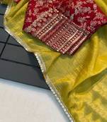 Attractive yellow crush tissue silk saree with jacquard weaving stitched blouse