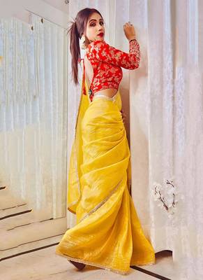 Attractive yellow crush tissue silk saree with jacquard weaving stitched blouse 3