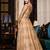 Soft premium net wedding wear semi stitch gown in golden color with embroidery