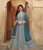 Dola silk party wear semi stitch gown in grey color with embroidery work and stone work