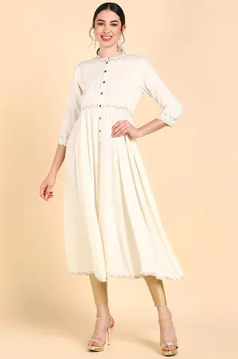 Women cream printed rayon ethnic kurti