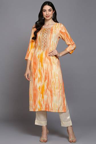Women cream printed rayon ethnic kurti