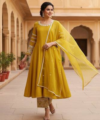 women yellow silk blend solid embroidered anarkali kurta palazzos with dupatta 1