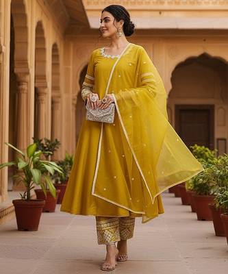 women yellow silk blend solid embroidered anarkali kurta palazzos with dupatta 3