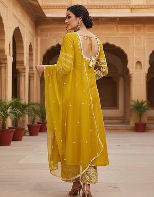 women yellow silk blend solid embroidered anarkali kurta palazzos with dupatta 4