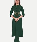 Green colour cotton fabric readymade suit with resham work for formal looks