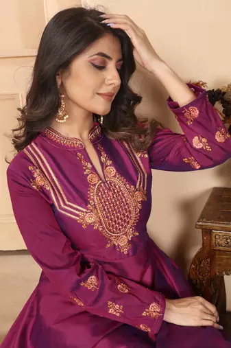 Heavy zari work purple colour graceful silk fabric partywear evening gown