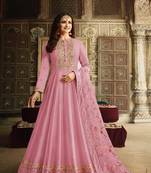Dola silk party wear semi stitch gown in pink color with embroidery work and stone work