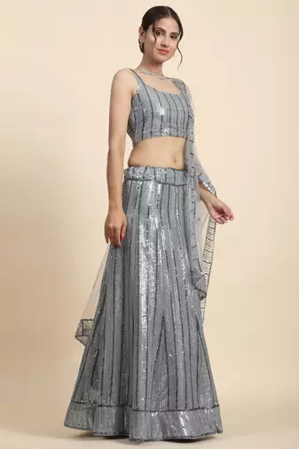 Entrancing Grey thread and sequins embroidered net designer lehenga choli