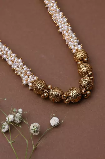 White Gold Beaded Jewellery With Golden Earrings