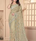 Beige Sequin Zari Resham Stone Embroidered Border Net Party Wear Saree With Matching Blouse Piece