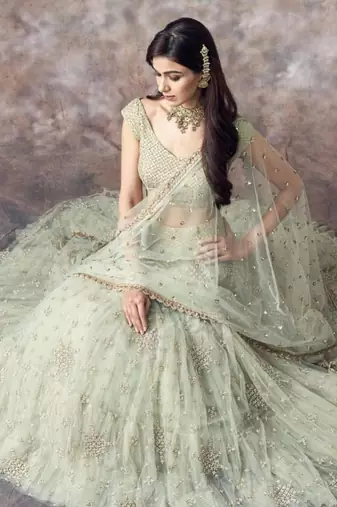 Catching Aqua Green 3Mm Sequin Embroidered Net Semi Stitched Lehenga Choli