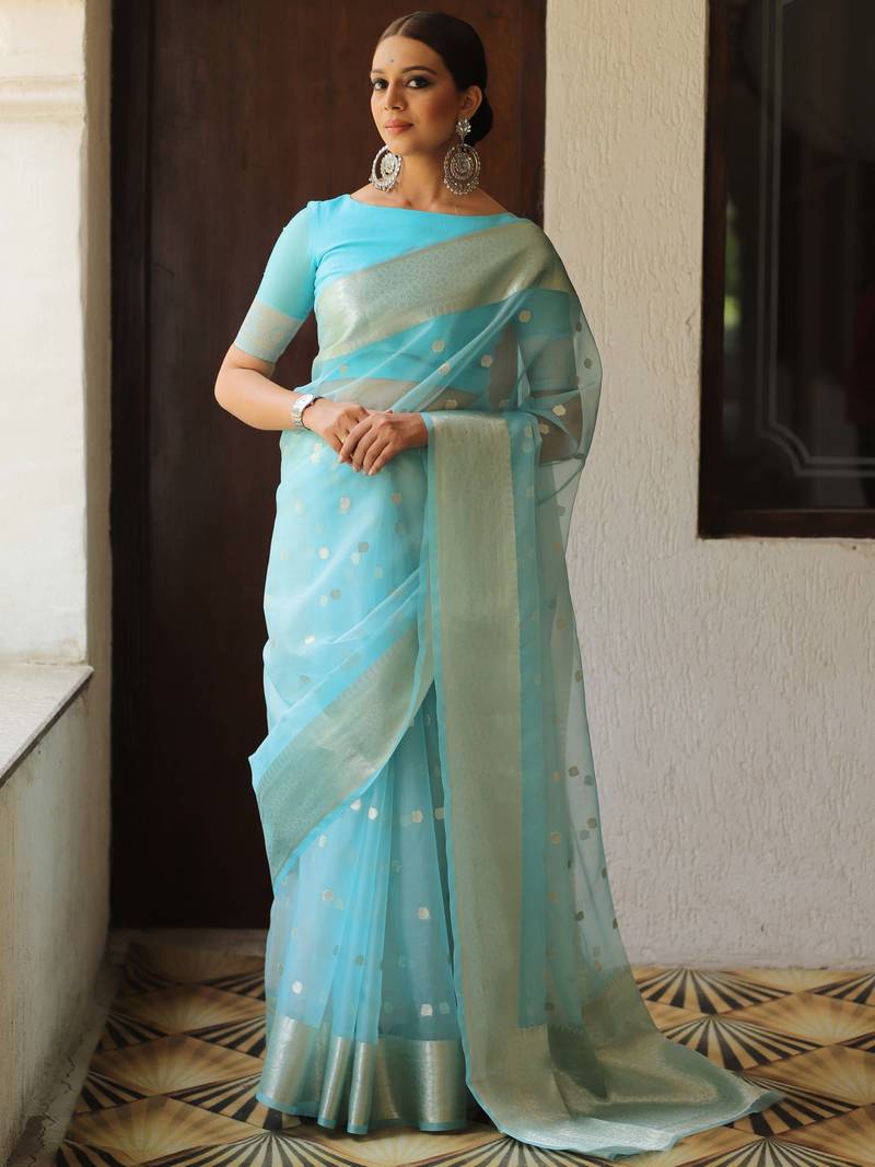 Woven With Tradition And Crafted For Modernity Organza Saree With Zari Butti Work And A Matching Organza Blouse 