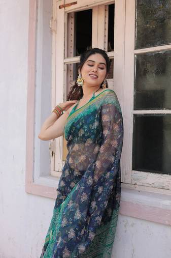 Navy blue kota doria/polyester floral print golden zari border saree with unstitched blouse piece