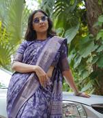 Dusty Blue silk blend kalamkari print/floral print golden woven border saree with unstitched blouse piece