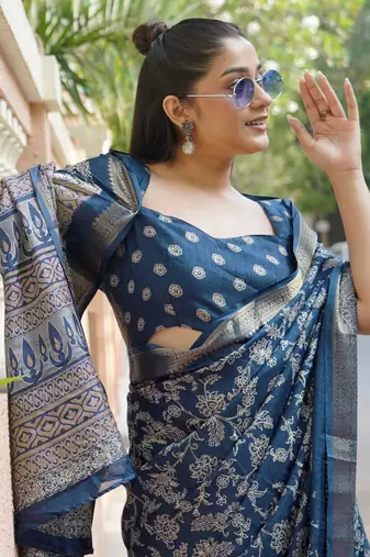 Dark rama blue silk blend kalamkari print/floral print golden woven border saree with unstitched blouse piece