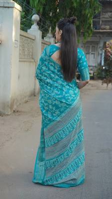 Teal silk blend kalamkari print/floral print golden woven border saree with unstitched blouse piece 4