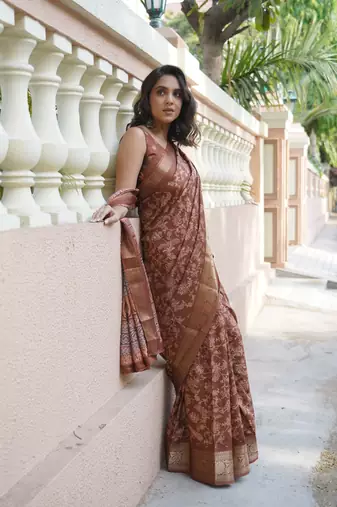 Dusty rust silk blend kalamkari print/floral print golden woven border saree with unstitched blouse piece