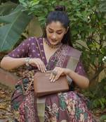 Wine silk blend floral print/batik print golden zari border saree with unstitched blouse piece