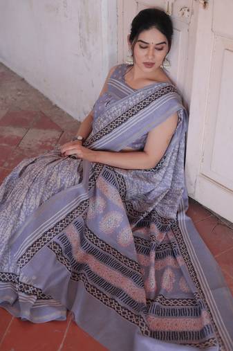 Light dusty purple silk blend abstract print golden zari border saree with unstitched blouse piece