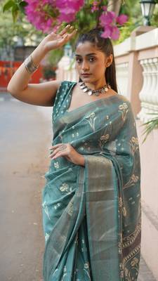 Dusty turquoise silk blend floral print/ikkat print/block print golden woven border saree with unstitched blouse piece 1