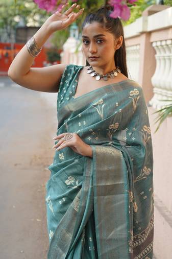 Dusty turquoise silk blend floral print/ikkat print/block print golden woven border saree with unstitched blouse piece