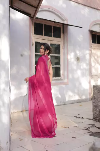 Rani Pink Georgette Solid/Zari And Satin Stripes Stone Border Saree Without Blouse