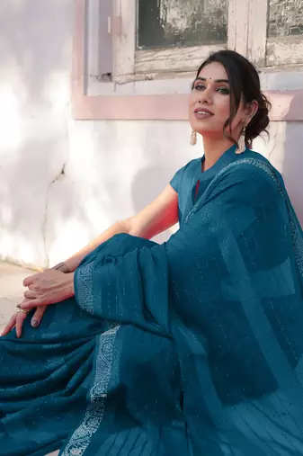 Dark Rama Blue Georgette Solid/Zari And Satin Stripes Stone Border Saree Without Blouse