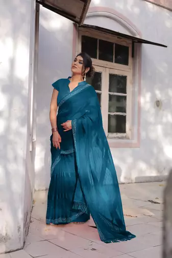 Dark Rama Blue Georgette Solid/Zari And Satin Stripes Stone Border Saree Without Blouse
