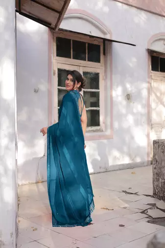 Dark Rama Blue Georgette Solid/Zari And Satin Stripes Stone Border Saree Without Blouse