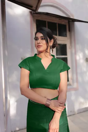 Dark Green Georgette Solid/Zari And Satin Stripes Stone Border Saree Without Blouse