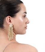 Glimmering gold earrings