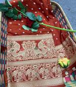 Koram Orange Bandhej kanjivaram silk blendBandhej With Kanjivaram Border With Zari Weaving Saree With Blouse For Women