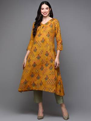 women mustard cotton blend floral printed a-line kurta 1
