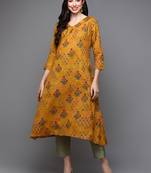 women mustard cotton blend floral printed a-line kurta
