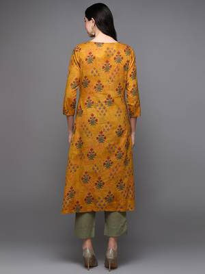 women mustard cotton blend floral printed a-line kurta 4
