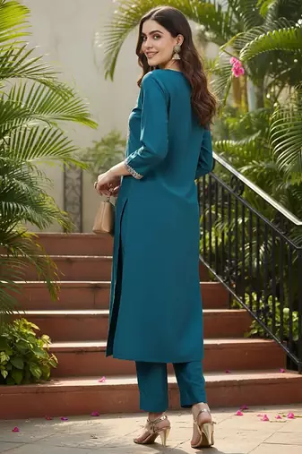 women teal silk blend solid embroidered straight kurta