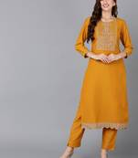women mustard silk blend solid embroidered straight kurta