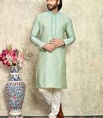Pista embroidered art silk kurta pajama
