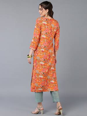 women orange viscose rayon quirky embroidered straight kurta 4