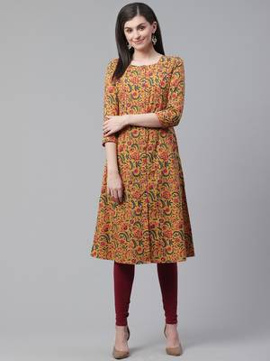women mustard cotton floral printed a-line kurta 1