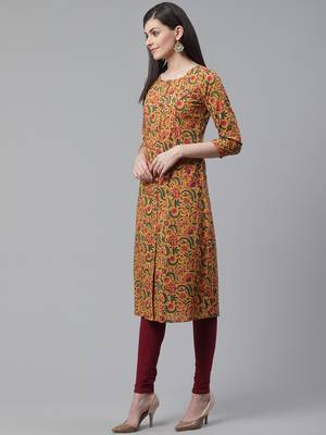 women mustard cotton floral printed a-line kurta 3