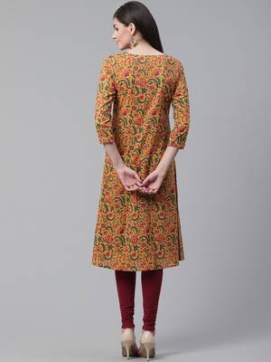 women mustard cotton floral printed a-line kurta 4
