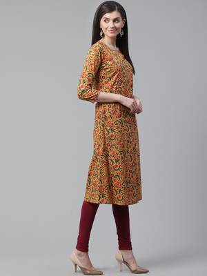 women mustard cotton floral printed a-line kurta 5