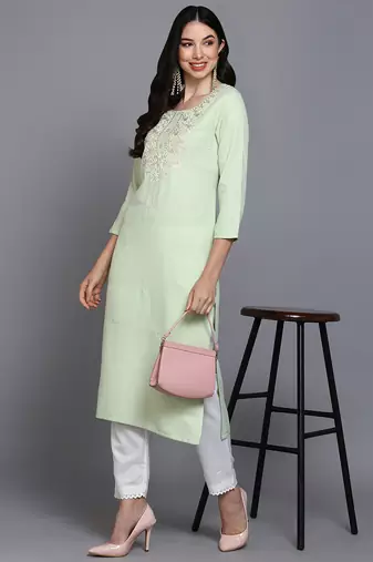 women lime green cotton blend solid embroidered straight kurta