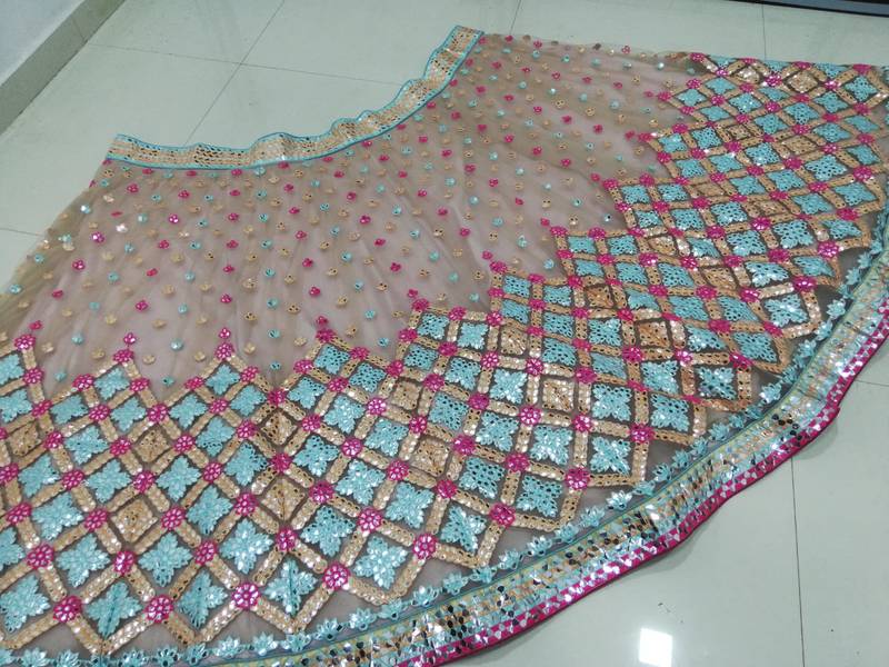Attractive Multicolored Cotton Thread Embroidered with paper mirror work net fabric Designer Lehenga choli designs