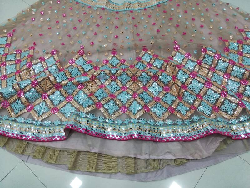 Attractive Multicolored Cotton Thread Embroidered with paper mirror work net fabric Designer Lehenga choli designs