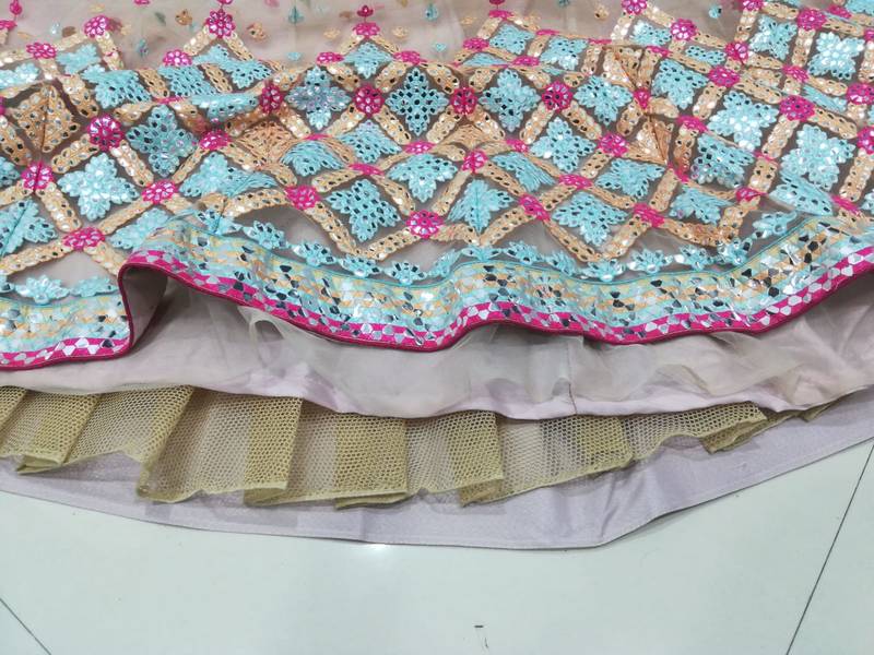 Attractive Multicolored Cotton Thread Embroidered with paper mirror work net fabric Designer Lehenga choli designs