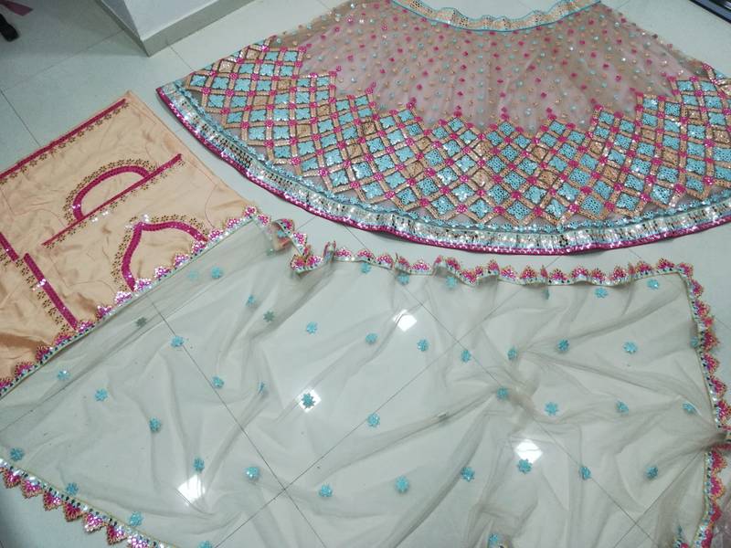 Attractive Multicolored Cotton Thread Embroidered with paper mirror work net fabric Designer Lehenga choli designs