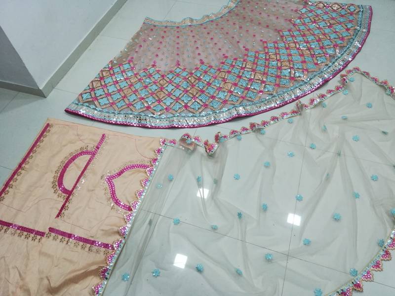 Attractive Multicolored Cotton Thread Embroidered with paper mirror work net fabric Designer Lehenga choli designs